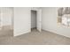 Bedroom with walk-in closet and neutral carpet at 104 Hill Side Ln, Dallas, GA 30157