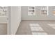 Neutral bedroom with large windows and plush gray carpet at 104 Hill Side Ln, Dallas, GA 30157