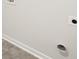 Close-up of the laundry room wall with hookups and space for washer and dryer at 104 Hill Side Ln, Dallas, GA 30157