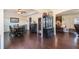 Elegant dining room with hardwood floors, decorative furniture, and an open layout connecting to other living areas at 307 Montgomery Way, Woodstock, GA 30188