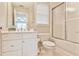 Bathroom featuring a single sink, shower, and window at 3816 Berrybridge Se Way, Marietta, GA 30067