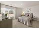 Cozy bedroom with comfortable bed, bright window, and stylish decor at 102 Hill Side Ln, Dallas, GA 30157