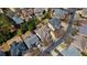 High angle view of the neighborhood presents mature trees and neatly arranged homes along a winding street at 12800 Wyngate Trl, Alpharetta, GA 30005