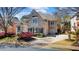 Beautiful brick home with well-manicured landscaping and a two-car garage at 12800 Wyngate Trl, Alpharetta, GA 30005