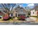 Charming two-story brick home with well-manicured lawn and beautiful landscaping in a desirable neighborhood at 12800 Wyngate Trl, Alpharetta, GA 30005