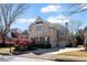 Charming two-story brick home with an attached two-car garage and well-manicured front yard with mature landscaping at 12800 Wyngate Trl, Alpharetta, GA 30005