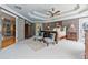 Spacious main bedroom has a trey ceiling and an ensuite bathroom with plenty of natural light at 12800 Wyngate Trl, Alpharetta, GA 30005