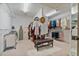 Large walk-in closet with ample shelving and storage space, ideal for organizing clothes and accessories at 12800 Wyngate Trl, Alpharetta, GA 30005