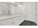 Elegant bathroom featuring double vanity, modern fixtures, and glass-enclosed shower at 2128 Cosette Ln, Kennesaw, GA 30152