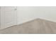 Close up of a room featuring white walls, carpet flooring and a white door at 2128 Cosette Ln, Kennesaw, GA 30152