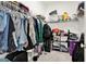 Spacious walk-in closet with ample storage and organization solutions for clothes and accessories at 2128 Cosette Ln, Kennesaw, GA 30152