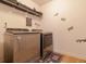 Functional laundry room with modern washer and dryer at 3137 Spicy Cedar Ln, Stonecrest, GA 30038