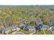 Stunning aerial view of an upscale residential neighborhood with lush greenery and beautifully designed homes at 835 Kenry Ct, Atlanta, GA 30342