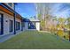 Beautifully landscaped backyard with a freshly cut lawn, ideal for Gathering gatherings and entertaining at 835 Kenry Ct, Atlanta, GA 30342