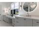 Bright bathroom with double vanity sinks, modern lighting and decor at 835 Kenry Ct, Atlanta, GA 30342