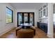 Cozy breakfast nook with natural light, table seating, and elegant cabinetry at 835 Kenry Ct, Atlanta, GA 30342