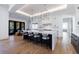 Spacious kitchen with modern white cabinetry, an oversized island, and stainless steel appliances at 835 Kenry Ct, Atlanta, GA 30342