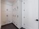 Mudroom with custom white cabinetry and plenty of storage space at 835 Kenry Ct, Atlanta, GA 30342