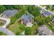 Luxury home with beautiful landscaping, pool, and sprawling green lawn at 1391 Harris Rd, Lawrenceville, GA 30043