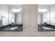 Elegant bathroom with double sinks, granite countertops, and white cabinetry at 1391 Harris Rd, Lawrenceville, GA 30043