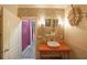 Stylish bathroom features a vessel sink, unique wall accents, and modern lighting fixtures at 1391 Harris Rd, Lawrenceville, GA 30043
