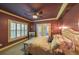 A large primary bedroom with a ceiling fan and access to a balcony at 1391 Harris Rd, Lawrenceville, GA 30043