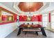 Formal dining room with stylish lighting and a unique ceiling design at 1391 Harris Rd, Lawrenceville, GA 30043