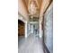 Grand foyer with soaring ceilings, elegant chandelier, and hardwood floors at 1391 Harris Rd, Lawrenceville, GA 30043