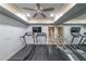 Home gym featuring two treadmills and a mirrored wall for exercise routines at 1391 Harris Rd, Lawrenceville, GA 30043