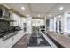 Gourmet kitchen with stainless steel appliances, granite counters, and modern finishes at 1391 Harris Rd, Lawrenceville, GA 30043