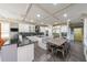 Spacious kitchen with granite countertops, custom cabinets, and a central island with seating at 1391 Harris Rd, Lawrenceville, GA 30043