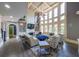 Spacious living room with high ceilings, fireplace, TV, and open layout at 1391 Harris Rd, Lawrenceville, GA 30043