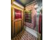 Themed movie theatre entrance with classic posters and brick details at 1391 Harris Rd, Lawrenceville, GA 30043