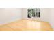 Bright bedroom with hardwood floors and large windows with wooded views at 1718 Barnesdale Ne Way, Atlanta, GA 30309