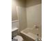 Bathroom featuring a bathtub and a toilet at 213 Sharon Drive, Canton, GA 30115