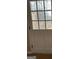 Glass paneled door leading to a wooden deck surrounded by a lush landscape at 213 Sharon Drive, Canton, GA 30115