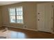 Inviting entryway featuring a window for natural light and a secure front door at 213 Sharon Drive, Canton, GA 30115