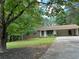 Charming single-story house with a well-maintained lawn at 213 Sharon Drive, Canton, GA 30115