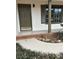 Inviting entryway with a solid front door, painted trim, and manicured garden bed at 213 Sharon Drive, Canton, GA 30115