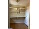Spacious pantry with ample shelving for organized storage at 213 Sharon Drive, Canton, GA 30115