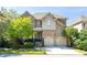 Charming two-story brick home with a two-car garage and manicured landscaping at 4022 Newhaven Ne Cir, Brookhaven, GA 30319