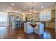 Open kitchen with island seating and stainless steel appliances next to the breakfast nook at 4022 Newhaven Ne Cir, Brookhaven, GA 30319