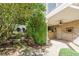 Backyard with stone steps leading to a covered porch with a ceiling fan at 4022 Newhaven Ne Cir, Brookhaven, GA 30319