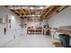 Unfinished basement with exposed beams, concrete walls, and lots of work space at 4022 Newhaven Ne Cir, Brookhaven, GA 30319