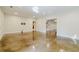 Large basement with polished floors, white walls, and open access to the staircase at 4022 Newhaven Ne Cir, Brookhaven, GA 30319