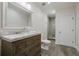 Bathroom featuring a vanity with a glass bowl sink and a glass shower at 4022 Newhaven Ne Cir, Brookhaven, GA 30319