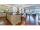 Open kitchen with dark countertops island adjoins living area for entertaining at 4022 Newhaven Ne Cir, Brookhaven, GA 30319