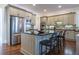 Spacious kitchen with stainless steel appliances, dark countertops and island seating at 4022 Newhaven Ne Cir, Brookhaven, GA 30319