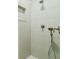 Modern tiled shower area featuring a handheld shower and a niche at 4022 Newhaven Ne Cir, Brookhaven, GA 30319