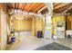 Unfinished basement features exposed utilities, including HVAC, a utility sink and plenty of room for storage at 1926 Regency Cove Ct, Atlanta, GA 30341